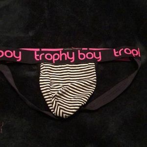 Trophy Boy jock!  Black and white striped jock with hot pink lettering.